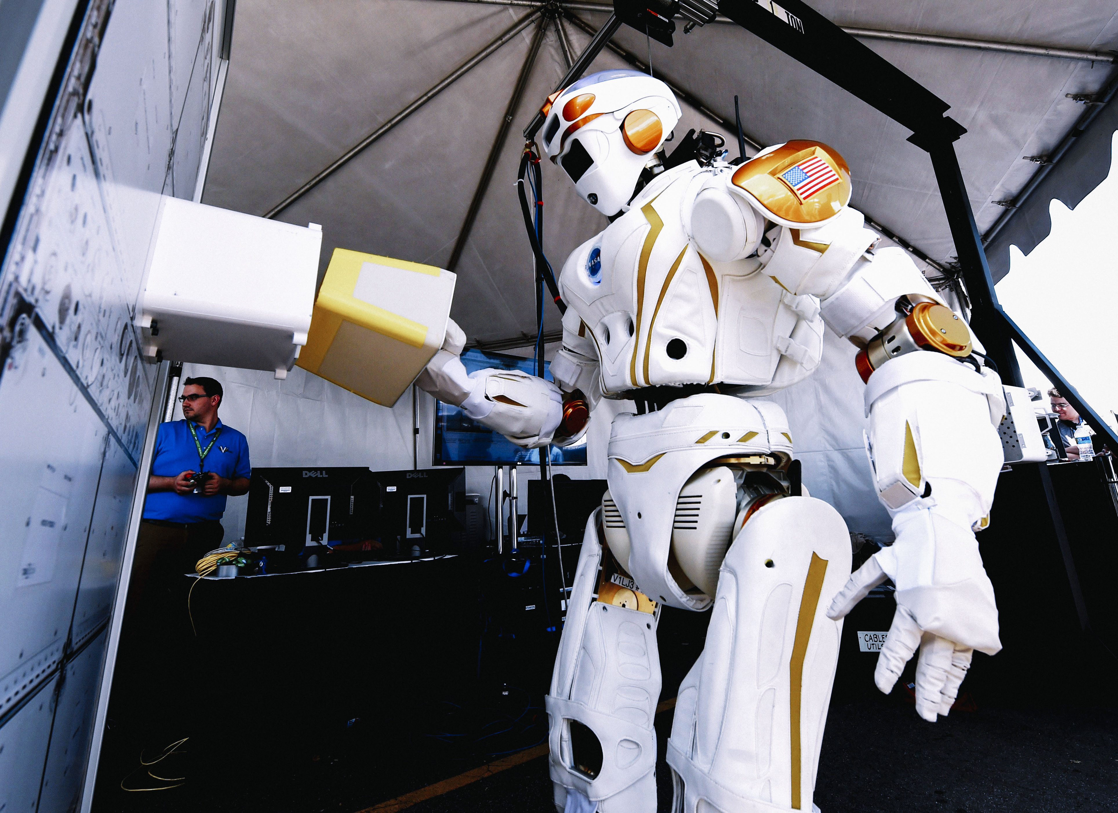 The humanoid robot named 'Valkyrie' designed by NASA is on display during the finals of the DARPA Robotics Challenge at the Fairplex complex in Pomona, California on June 5, 2015. The competition has 24 teams vying to develop robots capable of assisting humans in responding to natural and man-made disasters. AFP PHOTO/MARK RALSTON (Photo credit should read MARK RALSTON/AFP/Getty Images)